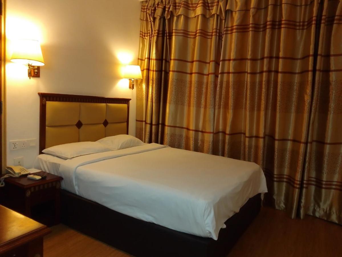 Super Oyo 90464 Borneo Suites Hotel Kota Kinabalu Zewnętrze zdjęcie